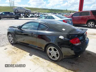 2006 Hyundai Tiburon GT z VIN KMHHN65F56U224768, wystawiony jako IAAI lot #40672721 z przebiegiem 158 535 mil mil oraz . Historia ofert i sprzedaży dostępna na DreamBid. Obrazek 15.