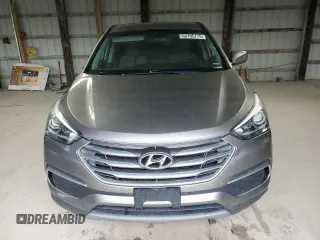 2018 Hyundai Santa Fe 2.4L z VIN 5NMZTDLB2JH096699, wystawiony jako Copart lot #53795775 z przebiegiem 165 794 mil mil oraz Szkoda całkowita • Salvage title. Historia ofert i sprzedaży dostępna na DreamBid. Obrazek 5.