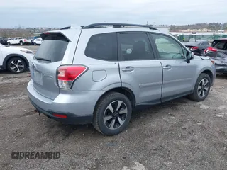 2017 Subaru Forester Premium with VIN JF2SJAEC8HG464589, listed as a IAAI auction lot 41943658 with 62,218 mi miles. Bid and sale history available at carsss.com. Image 4.