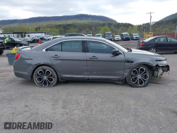 2014 Ford Taurus SHO with VIN 1FAHP2KTXEG160800, listed as a IAAI auction lot 42083237 with 75,048 mi miles. Bid and sale history available at carsss.com. Image 14.