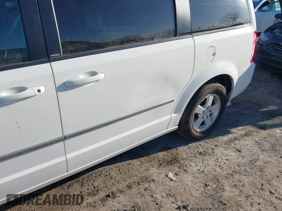 2010 Dodge Grand Caravan SXT with VIN 2D4RN5DX8AR239352, listed as a IAAI auction lot 41773487 with 86,084 mi miles and . Bid and sale history available at DreamBid. Image 6.