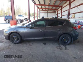 2018 Mazda 3 Touring with VIN 3MZBN1L35JM229453, listed as a IAAI auction lot 42123176 with 113,051 mi miles and . Bid and sale history available at DreamBid. Image 14.