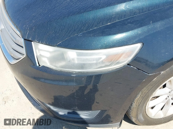 2014 Ford Taurus SE z VIN 1FAHP2D84EG162910, wystawiony jako IAAI lot #41779137 z przebiegiem Nie podano mil oraz . Historia ofert i sprzedaży dostępna na DreamBid. Obrazek 6.