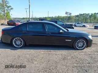 2015 BMW 7 Series 750Li with VIN WBAYE8C50FD781384, listed as a IAAI auction lot 42049829 with 128,087 mi miles and . Bid and sale history available at carsss.com. Image 13.