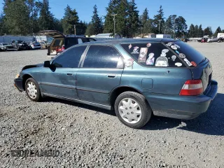 1997 Honda Accord LX with VIN 1HGCE1827VA005872, listed as a Copart auction lot 73034134 with 189,066 mi miles and Salvage Title. Bid and sale history available at carsss.com. Image 2.