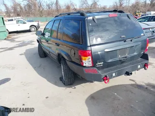 2004 Jeep Grand Cherokee Limited with VIN 1J4GW58N74C120435, listed as a IAAI auction lot 41815094 with 193,056 mi miles. Bid and sale history available at carsss.com. Image 3.