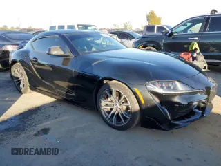 2022 Toyota GR Supra 2.0 with VIN WZ1DB2C08NW047883, listed as a Copart auction lot 84032614 with 26,907 mi miles and Salvage Title. Bid and sale history available at carsss.com. Image 4.