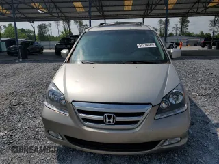 2006 Honda Odyssey Touring с VIN 5FNRL38866B506730, выставлен на аукционе Copart как лот 54214865 с пробегом 241 982 миль миль и Списание • Salvage title. История ставок и продаж доступна на DreamBid. Изображение 5.