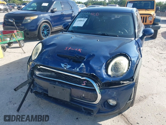 2016 MINI Cooper Hardtop 4 Door S with VIN WMWXU3C54G2D30766, listed as a IAAI auction lot 42008026 with 101,898 mi miles. Bid and sale history available at carsss.com. Image 6.