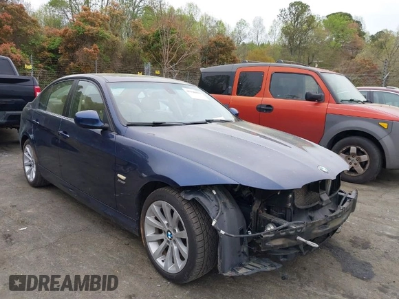 2011 BMW 3 Series 328i xDrive with VIN WBAPK5C50BA658103, listed as a IAAI auction lot 41948893 with 122,283 mi miles. Bid and sale history available at carsss.com. Image 1.