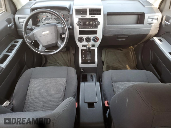 2008 Jeep Patriot Sport with VIN 1J8FT28W18D520047, listed as a Copart auction lot 59384295 with 176,770 mi miles and Salvage title. Bid and sale history available at DreamBid. Image 8.