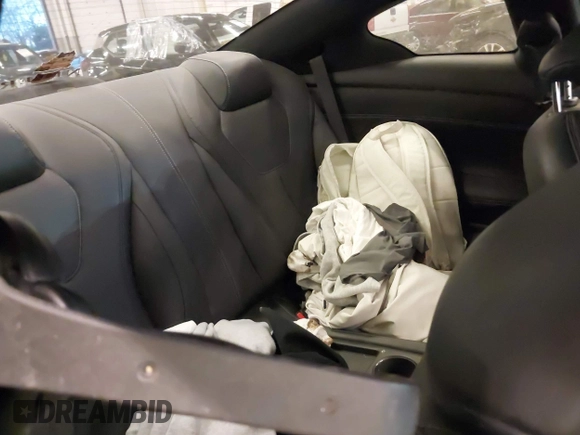 2018 Infiniti Q60 Luxe with VIN JN1EV7EL1JM393037, listed as a IAAI auction lot 41308526 with 54,065 mi miles and . Bid and sale history available at DreamBid. Image 8.