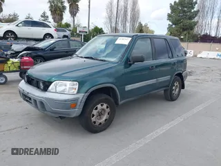 1999 Honda CR-V LX with VIN JHLRD2847XC014469, listed as a IAAI auction lot 41987027 with 307,727 mi miles. Bid and sale history available at carsss.com. Image 2.