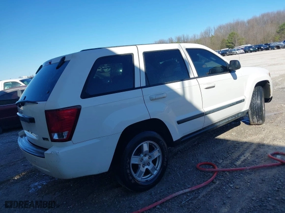 2007 Jeep Grand Cherokee Laredo with VIN 1J8HS48PX7C657685, listed as a IAAI auction lot 41748528 with 247,534 mi miles. Bid and sale history available at carsss.com. Image 4.