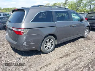 2012 Honda Odyssey EX-L with VIN 5FNRL5H69CB067867, listed as a IAAI auction lot 42225228 with Not provided miles and . Bid and sale history available at DreamBid. Image 4.