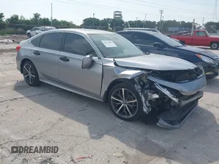 2022 Honda Civic Touring with VIN 2HGFE1F9XNH316565, listed as a IAAI auction lot 42356028 with Not provided miles and . Bid and sale history available at DreamBid. Image 1.
