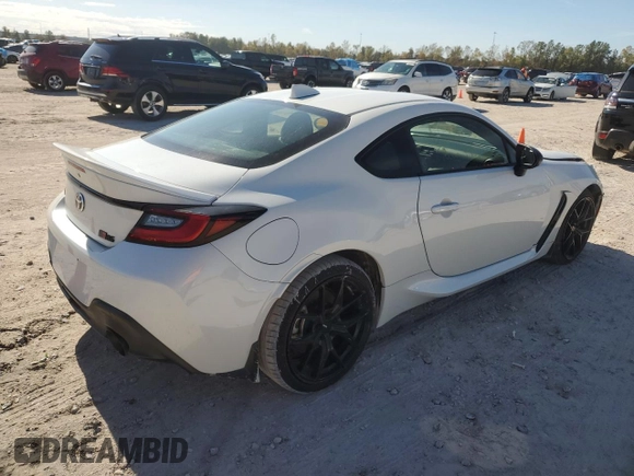 2023 Toyota GR86 Premium with VIN JF1ZNBE10P9762875, listed as a Copart auction lot 85042844 with 10,593 mi miles and Salvage Title. Bid and sale history available at carsss.com. Image 3.
