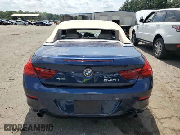 2014 BMW 6 Series 640i xDrive z VIN WBAYP5C58EDZ28025, wystawiony jako Copart lot #60070315 z przebiegiem 92 038 mil mil oraz Czysty tytuł • Clean title. Historia ofert i sprzedaży dostępna na DreamBid. Obrazek 6.