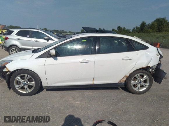 2013 Ford Focus SE with VIN 1FADP3F28DL215983, listed as a IAAI auction lot 42659890 with 117,912 mi miles and . Bid and sale history available at DreamBid. Image 14.