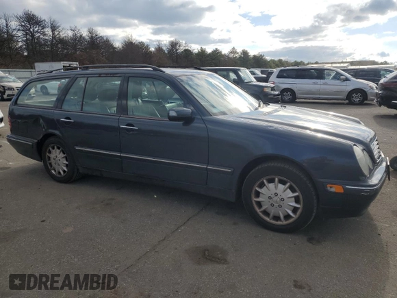 2001 Mercedes-Benz E-Class AWD with VIN WDBJH82J81X052002, listed as a Copart auction lot 82832724 with 187,464 mi miles and Salvage Title. Bid and sale history available at carsss.com. Image 4.