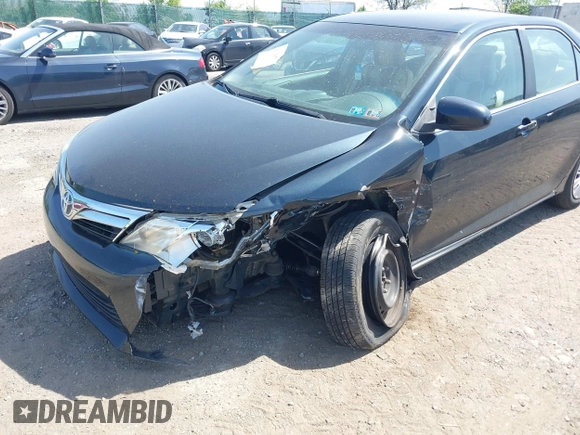 2012 Toyota Camry L with VIN 4T1BF1FK0CU599819, listed as a IAAI auction lot 42158719 with 130,038 mi miles. Bid and sale history available at carsss.com. Image 6.