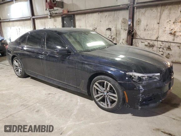 2017 BMW 7 Series with VIN WBA7F2C34HG423291, listed as a Copart auction lot 42914665 with 61,113 mi miles and Salvage Title. Bid and sale history available at DreamBid. Image 4.
