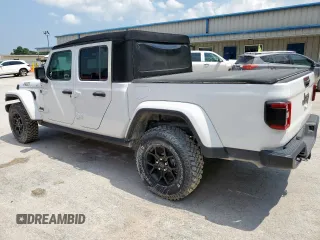 2024 Jeep Gladiator Sport S z VIN 1C6HJTAG2RL113030, wystawiony jako Copart lot #59023085 z przebiegiem Nie podano mil oraz Nie do naprawy • Non repairable. Historia ofert i sprzedaży dostępna na DreamBid. Obrazek 2.