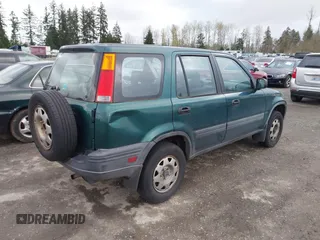 2000 Honda CR-V LX with VIN JHLRD2841YC008586, listed as a IAAI auction lot 41946219 with 198,245 mi miles. Bid and sale history available at carsss.com. Image 4.