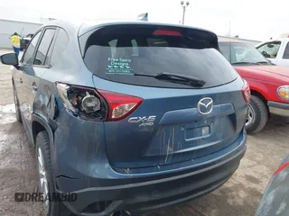 2014 Mazda CX-5 Grand Touring with VIN JM3KE4DYXE0403192, listed as a IAAI auction lot 41828016 with 156,270 mi miles and . Bid and sale history available at carsss.com. Image 16.