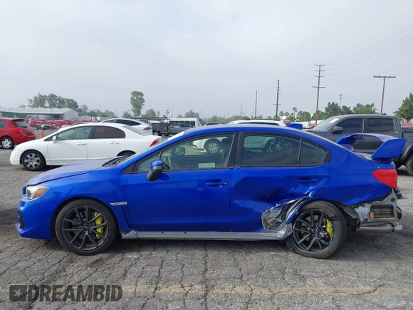 2020 Subaru WRX STI with VIN JF1VA2E63L9806965, listed as a IAAI auction lot 42342839 with 106,863 mi miles and . Bid and sale history available at DreamBid. Image 15.