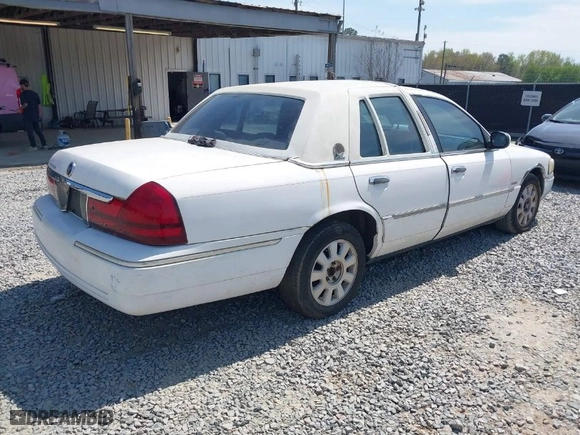 2003 Mercury Grand Marquis LS Premium with VIN 2MEFM75W93X606017, listed as a IAAI auction lot 41899723 with 132,599 mi miles. Bid and sale history available at carsss.com. Image 4.