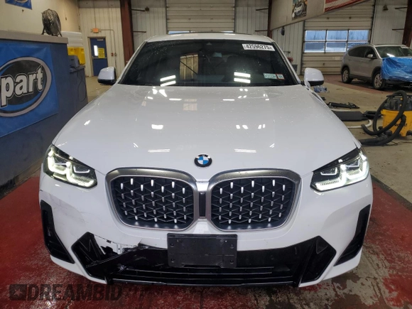 2023 BMW X4 xDrive30i with VIN 5UX33DT07P9P12954, listed as a Copart auction lot 42596275 with 27,590 mi miles and Salvage Title. Bid and sale history available at carsss.com. Image 5.