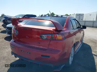 2012 Mitsubishi Lancer GT with VIN JA32U8FW8CU014358, listed as a IAAI auction lot 42502795 with 277,869 mi miles and . Bid and sale history available at DreamBid. Image 4.