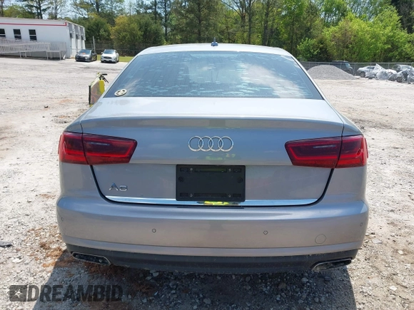 2016 Audi A6 Premium z VIN WAUCFAFC2GN111968, wystawiony jako IAAI lot #42003738 z przebiegiem 149 089 mil mil oraz . Historia ofert i sprzedaży dostępna na DreamBid. Obrazek 16.