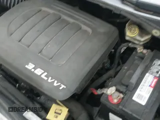 2014 Dodge Grand Caravan SE with VIN 2C4RDGBG3ER412053, listed as a IAAI auction lot 42663202 with 246,888 mi miles and . Bid and sale history available at DreamBid. Image 19.