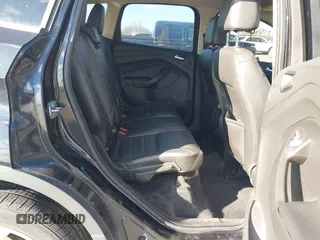 2015 Ford Escape Titanium with VIN 1FMCU0JX8FUC34459, listed as a IAAI auction lot 41394012 with 154,077 mi miles. Bid and sale history available at carsss.com. Image 8.