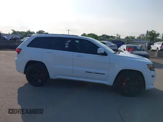 2016 Jeep Grand Cherokee SRT with VIN 1C4RJFDJ3GC503878, listed as a IAAI auction lot 42830257 with 82,661 mi miles and . Bid and sale history available at DreamBid. Image 6.