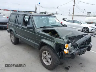 1996 Jeep Cherokee Sport with VIN 1J4FT68S6TL267408, listed as a IAAI auction lot 42385629 with 268,753 mi miles and . Bid and sale history available at DreamBid. Image 1.