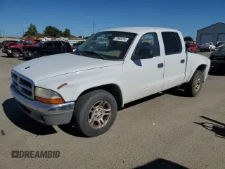2004 Dodge Dakota SLT with VIN 1D7HL48N94S674827, listed as a Copart auction lot 72969214 with 248,387 mi miles and Salvage Title. Bid and sale history available at carsss.com. Image 1.