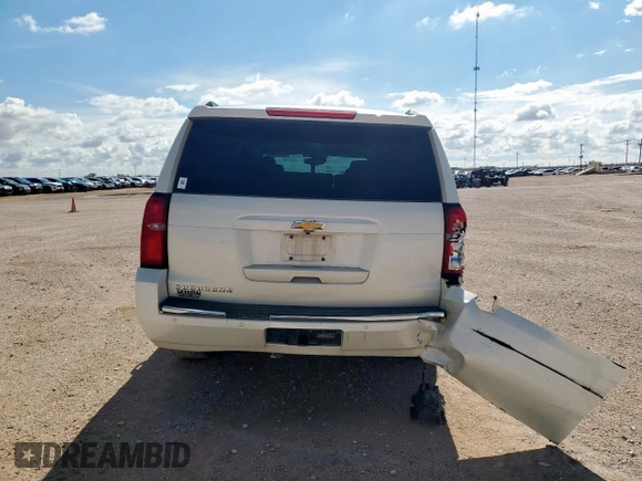 2015 Chevrolet Suburban LTZ with VIN 1GNSCKKC6FR705660, listed as a Copart auction lot 60328685 with 174,247 mi miles and Salvage title. Bid and sale history available at DreamBid. Image 6.