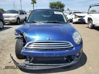 2012 MINI Hardtop z VIN WMWSU3C5XCT368997, wystawiony jako Copart lot #54622735 z przebiegiem 104 261 mil mil oraz Szkoda całkowita • Salvage title. Historia ofert i sprzedaży dostępna na DreamBid. Obrazek 5.