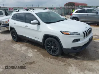 2014 Jeep Cherokee Latitude z VIN 1C4PJLCS9EW122953, wystawiony jako IAAI lot #42120666 z przebiegiem 118 299 mil mil oraz . Historia ofert i sprzedaży dostępna na DreamBid. Obrazek 1.