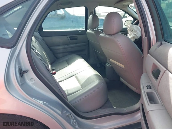 2004 Ford Taurus SEL with VIN 1FAFP56SX4A156094, listed as a IAAI auction lot 41688747 with 126,339 mi miles. Bid and sale history available at carsss.com. Image 8.