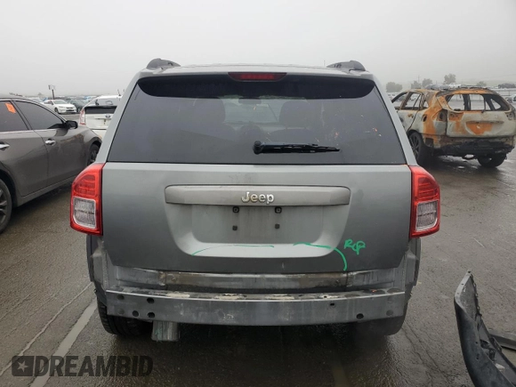 2011 Jeep Compass Latitude with VIN 1J4NT1FB6BD248643, listed as a Copart auction lot 86403584 with 179,795 mi miles and Salvage Title. Bid and sale history available at carsss.com. Image 6.