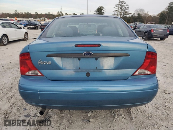 2001 Ford Focus LX with VIN 1FAHP33P01W332260, listed as a Copart auction lot 83221654 with 104,028 mi miles and Salvage Title. Bid and sale history available at DreamBid. Image 6.