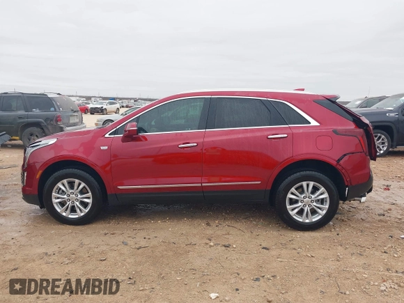 2023 Cadillac XT5 FWD Luxury z VIN 1GYKNAR42PZ147121, wystawiony jako IAAI lot #41315848 z przebiegiem 10 444 mil mil oraz . Historia ofert i sprzedaży dostępna na DreamBid. Obrazek 14.