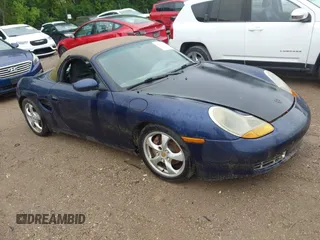 2002 Porsche Boxster z VIN WP0CA29822U622397, wystawiony jako IAAI lot #42368183 z przebiegiem 189 696 mil mil oraz . Historia ofert i sprzedaży dostępna na DreamBid. Obrazek 1.