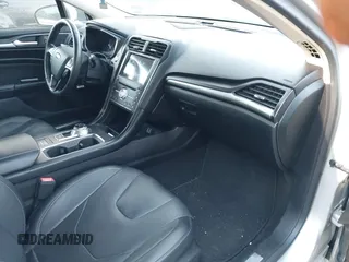 2019 Ford Fusion Titanium with VIN 3FA6P0SU8KR212370, listed as a IAAI auction lot 42114934 with 42,521 mi miles and . Bid and sale history available at DreamBid. Image 5.