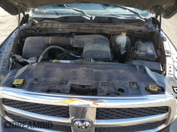 2015 Ram 1500 SLT z VIN 1C6RR6GG7FS685847, wystawiony jako Copart lot #49169675 z przebiegiem 139 408 mil mil oraz Szkoda całkowita • Salvage title. Historia ofert i sprzedaży dostępna na DreamBid. Obrazek 13.