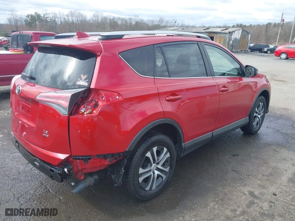 2016 Toyota RAV4 LE with VIN JTMBFREV2GJ097058, listed as a IAAI auction lot 41720372 with 118,606 mi miles. Bid and sale history available at carsss.com. Image 4.